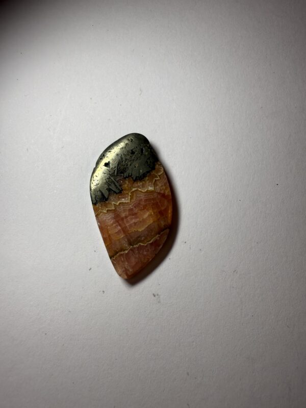 Rhodochrosite w/Pyrite Cab (218)