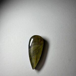Rutilated quartz doublet (076)